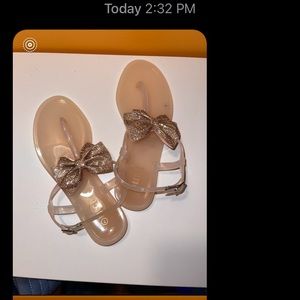 Rouge Helium new sandals, size 7, clear with a brownish gold bow